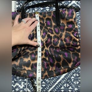 Coach purple ocelot purse.